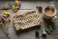 Lifestyle flat lay - rustic wood with dried flowers
